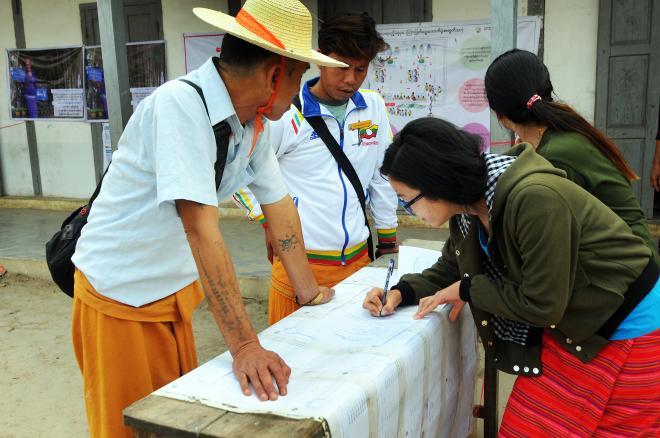 voters checking off their names at polling booths at wan hai high school shan state steve tickner