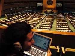 Natalie Sikorski, NP Advocacy intern, monitors the General Assembly deliberations on the resolution for the Culture of Peace.