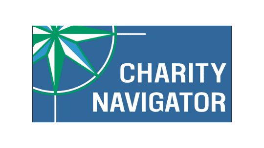 a logo with the text "CHARITY NAVIGATOR" and an icon resembling a compass or globe.