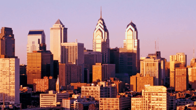 Philadelphia city skyline with several buildings and a prominent skyscraper.