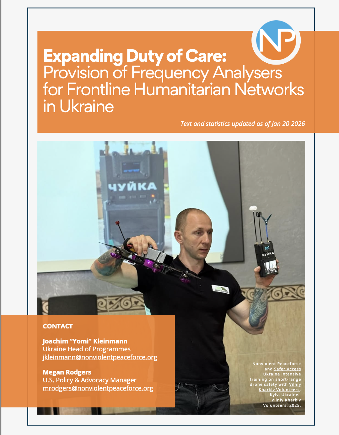 English-language report cover titled “Expanding Duty of Care: Provision of Frequency Analysers for Frontline Humanitarian Networks in Ukraine,” dated January 2026. A man demonstrates drone safety equipment, holding a small drone and a handheld frequency analyzer, with a projected image of the device in the background. An orange header and contact information for Nonviolent Peaceforce staff are included on the page.