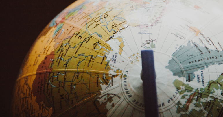 A globe displaying the Arctic Circle